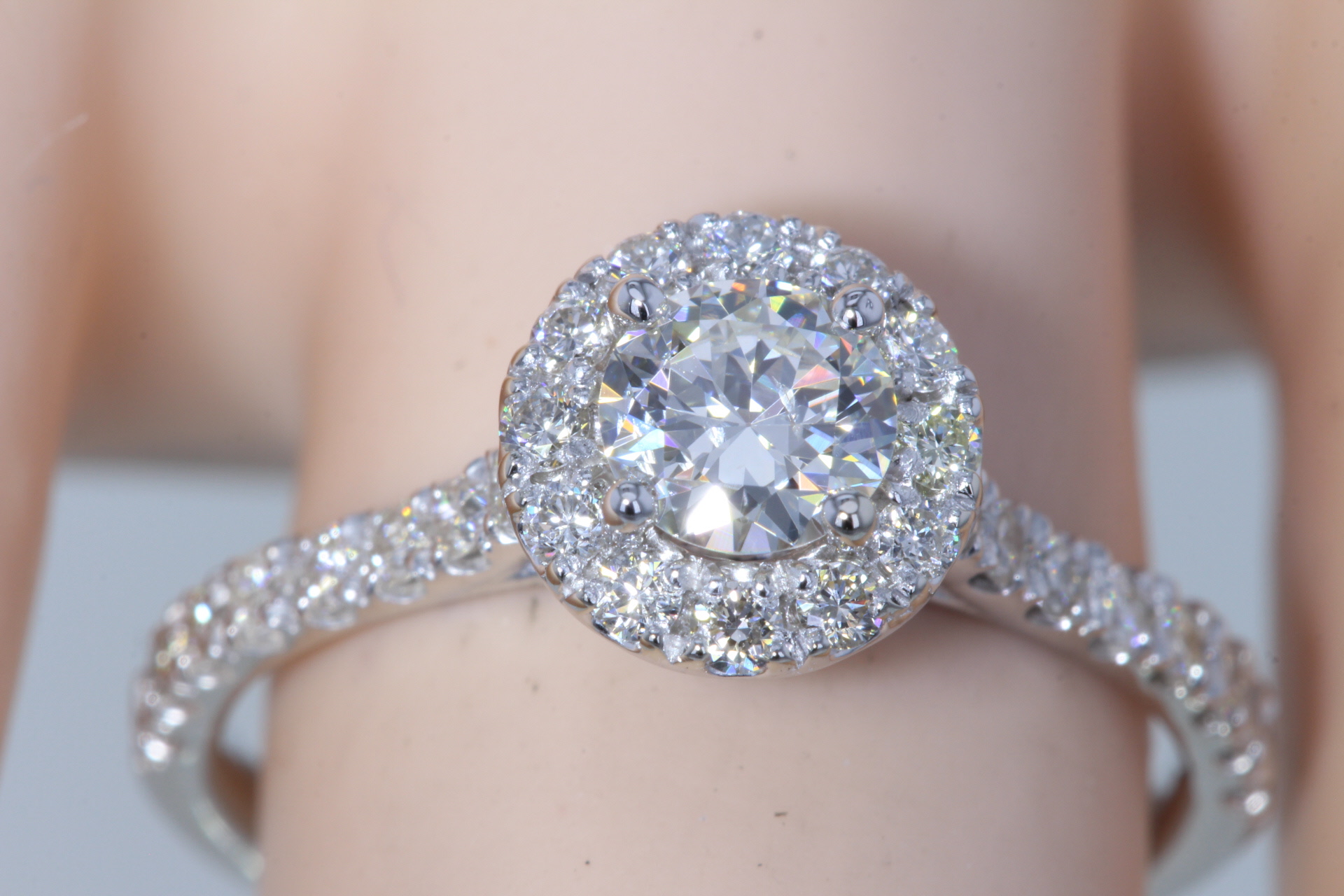 Round diamond halo engagement ring 